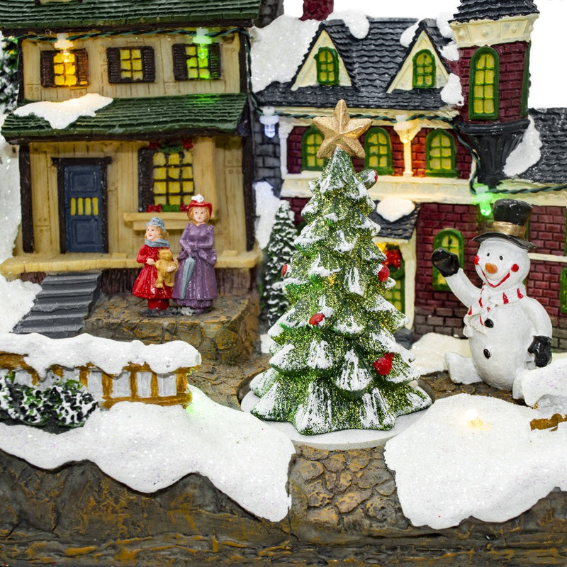 Villaggio Natalizio Innevato 37x16x18 cm con Luci Suoni e Movimento