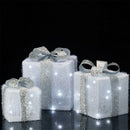Set 3 Pacchi Regalo Natalizi Luminosi 25-20-15 cm con 48 LED Bianco Freddo in Rattan Bianco con Fiocco Argento      