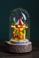 Giostra di Natale con musica, luci e movimento 23,5 cm in Resina