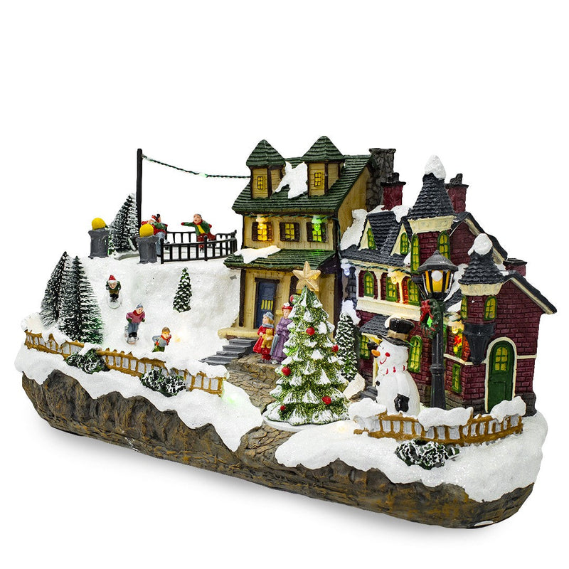 Villaggio Natalizio Innevato 37x16x18 cm con Luci Suoni e Movimento