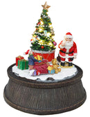 Babbo Natale con Albero e Pacchi Regalo Carillon 20,5x20,5x22,5 cm in Resina con Movimento e Luci