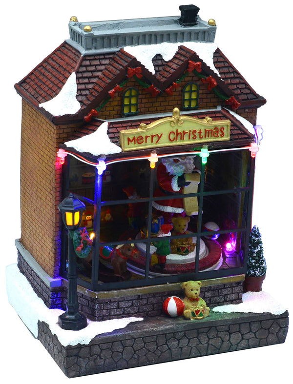 prezzo Weihnachtsdorf aus Harz Santa's Shop mit Lichtern und Sounds 17x15xh23 cm Adami