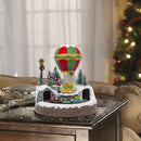 Mongolfiera Villaggio Natalizio 19x19x23cm con Luci Musica e Movimento