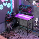 Scrivania Angolare Reversibile LED integrati Prese USB Ripiani e Supporto Monitor Nero 