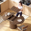 Tavolo Espandibile per 6-8 Persone da Rotondo a Ovale 150x110x75 cm con Base a Piedistallo in MDF e Acciaio Color Noce Scuro      