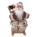 Babbo natale in tessuto su slitta marrone 30h cm