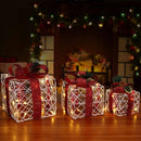Set 3 Pacchi Regalo Natalizi Luminosi 25-20-15 cm con 48 LED Bianco Caldo in Rattan Bianco con Fiocco Rosso      