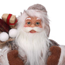 Babbo natale in tessuto su slitta marrone 30h cm