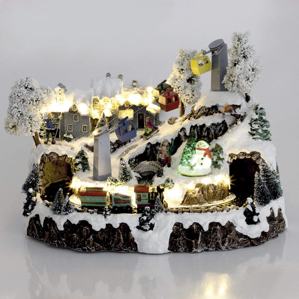 Weihnachtsdorf aus Harz 39x28x30 cm Zug mit Lichtern und Geräuschen online